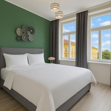Kinsky Garden Apartments And Suites By Dwellfort Prag Exteriör bild