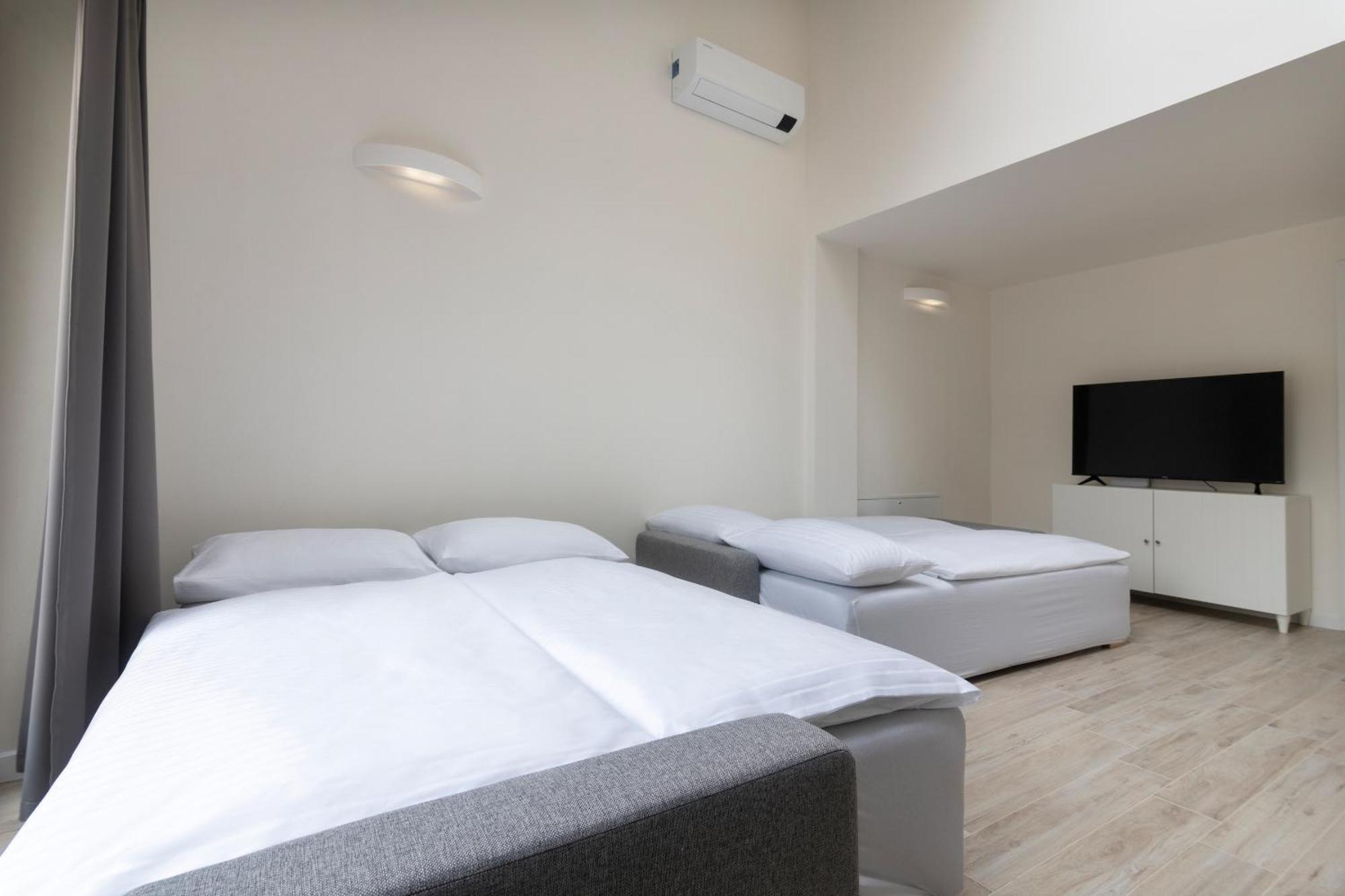 Kinsky Garden Apartments And Suites By Dwellfort Prag Rum bild